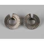 A pair of Georg Jensen sterling silver circular earclips, designed by Jorgen Jensen, each formed