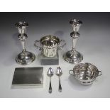 A George V silver two-handled cup, the 'U' shaped body flanked by two dolphin mask scroll handles,