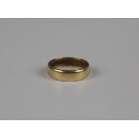 An 18ct gold wedding ring, London 1961, weight 3.6g, ring size approx J1/2.Buyer’s Premium 29.4% (