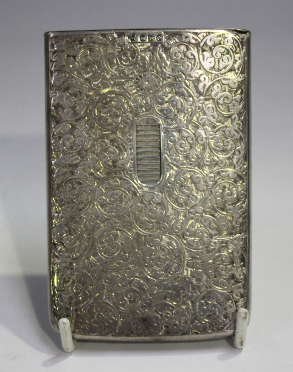 A late Victorian Needham's patent silver card case of rectangular form, engraved with foliate - Image 10 of 10