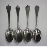 A group of four 18th century Dutch silver dog nose spoons, each bowl back with rat tail, various