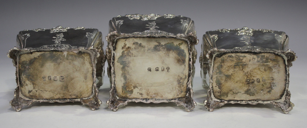 A set of three George III silver graduated tea caddies and covers with strawberry finials, each of - Image 28 of 30