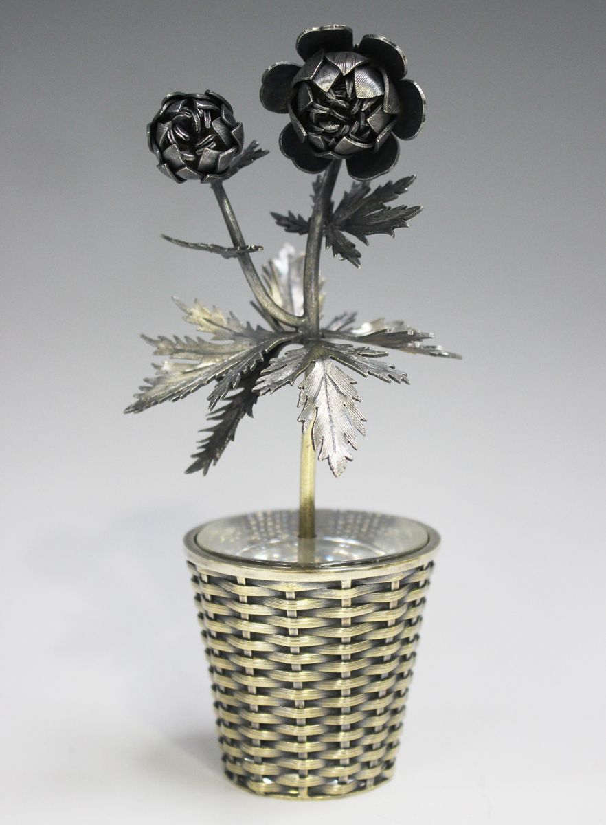 A Tiffany Mexico sterling model of a flower stem in a woven effect basket, designed by Janna Thomas,