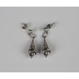 A pair of Georg Jensen silver pendant earrings, each in the form of a cornucopia, detailed 'Georg