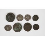 A collection of Roman coins, including a Gordian III sestertius, a Volusian antoninianus and a