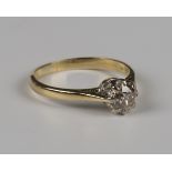 An 18ct gold ring, claw set with a circular cut diamond, London 1995, weight 2.9g, ring size