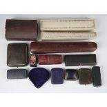 A collection of twenty various jewellery boxes and cases, including a maroon leather demiparure