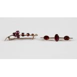 A gold, garnet and seed pearl brooch, designed as a spray, detailed '9ct', weight 1.9g, width 4.1cm,