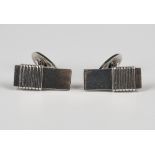 A pair of Georg Jensen silver bar cufflinks, designed by Harold Nielson, with vertical banded