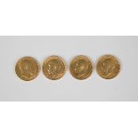 A group of four gold sovereigns, comprising Edward VII 1909, George V 1911, George V 1913 and George