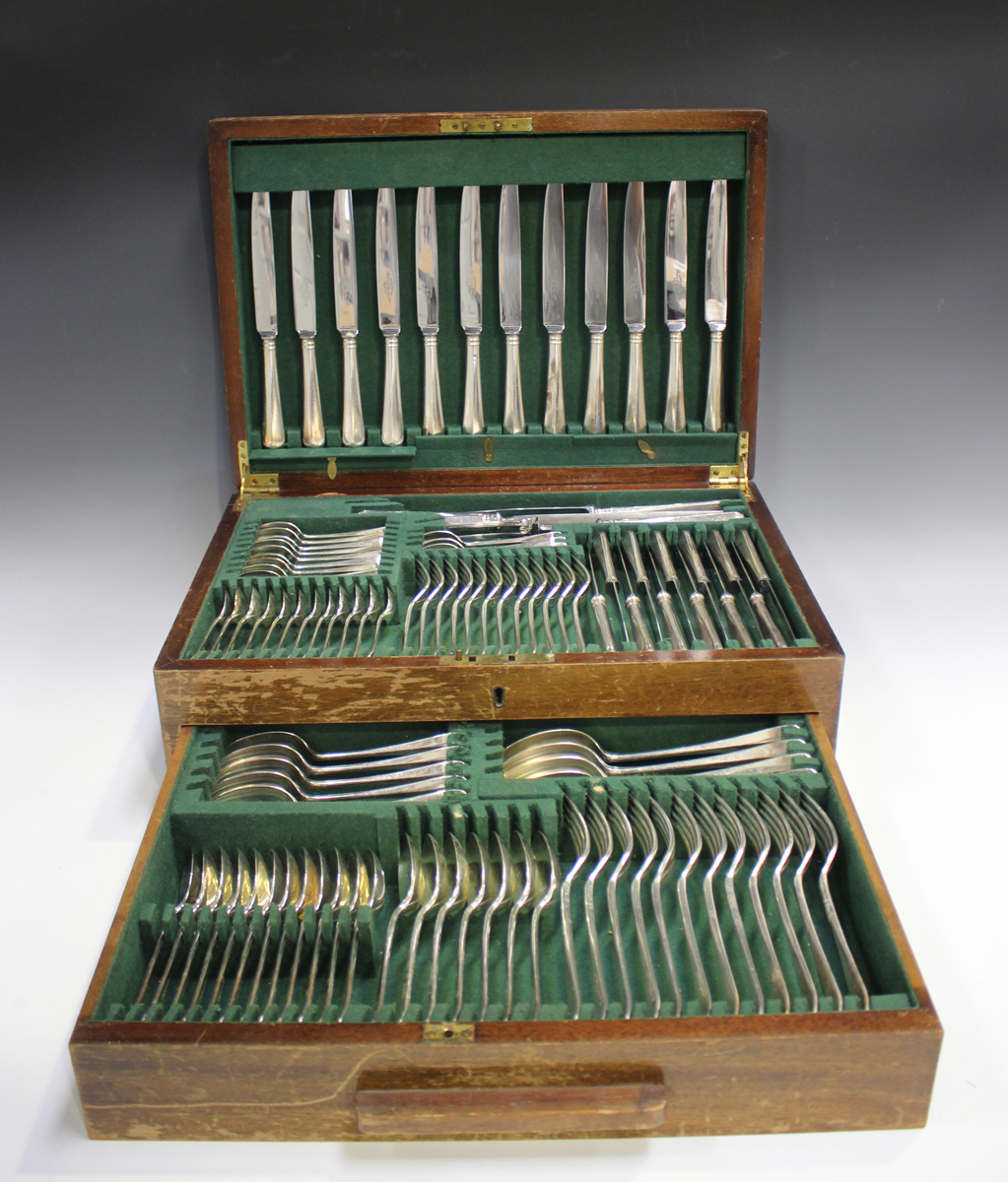 A part canteen of plated Rat Tail pattern cutlery, comprising twelve table knives and forks, four