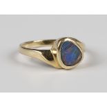 A 14ct gold ring, mounted with an opal doublet, London 2003, weight 2.8g, ring size approx M.Buyer’s