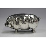 An Edwardian silver novelty hatpin stand in the form of a pig, Birmingham 1904 by Levi & Salaman,