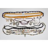 A group of mostly costume jewellery, including some silver, comprising an abalone shell cameo and