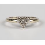 An 18ct gold and diamond triangular cluster ring, mounted with ten circular cut diamonds, weight 2.