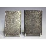 A late Victorian Needham's patent silver card case of rectangular form, engraved with foliate