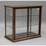 An early 20th century mahogany framed counter-top display cabinet, one side etched with 'Terry