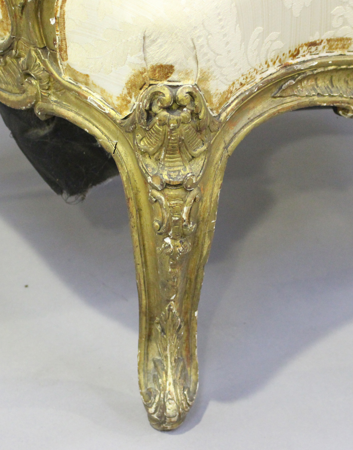 A 19th century French giltwood showframe fauteuil armchair with carved scroll decoration, on - Image 4 of 10