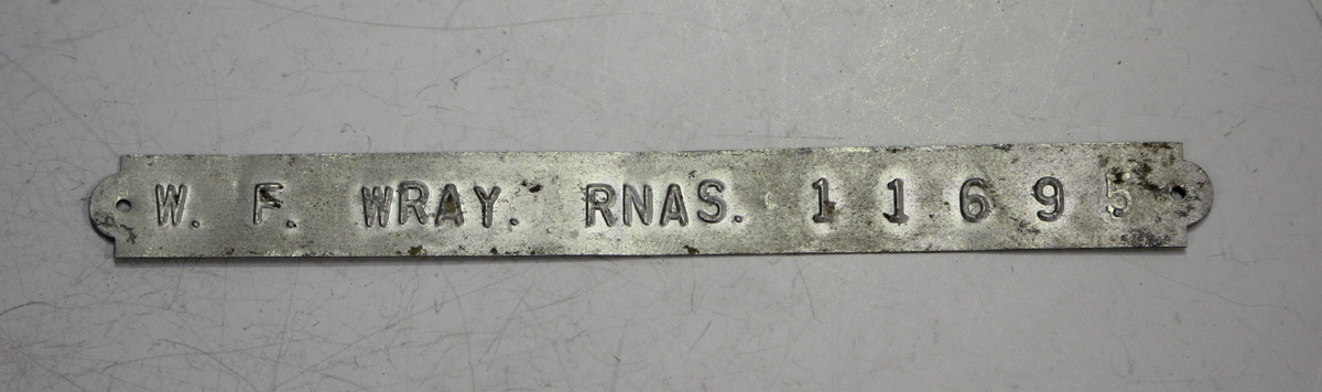 An aluminium strip name plate, detailed 'W.F.Wray. RNAS. 11695', together with a named group - Image 2 of 2