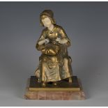 Charlotte H. Monginot - an early 20th century French gilt bronze chryselephantine and carved ivory