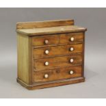 A Victorian mahogany table-top chest of drawers with turned ivory handles, height 35cm, width