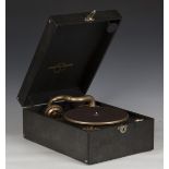A Columbia mechanical portable gramophone with a black leatherette case, width 29cm.Buyer’s