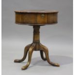 An early 20th century walnut oval drum-top work table, on cabriole legs, height 56cm, width 45cm,