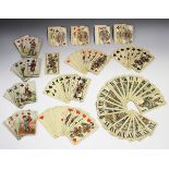A small group of playing cards, comprising a pack of 53 tarot cards by Ferdinand Piatnik & Sohne