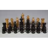 A late Victorian St George pattern boxwood and ebonized chess set, height of king 10.8cm (some