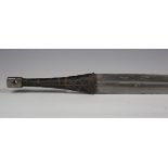 A late 19th century Omani katara with double-edged single-fullered blade, blade length 86cm, with