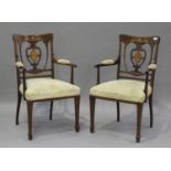 A pair of Edwardian walnut salon armchairs with inlaid decoration, height 95cm, width 55cm.Buyer’s