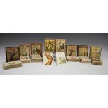 A group of eight wooden cased playing card games, including 'Sons of the Empire', 'Fairy Snap', '