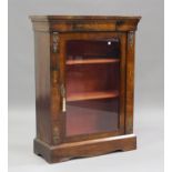 A mid-Victorian walnut and foliate inlaid pier cabinet with gilt metal mounts, fitted with a