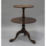 A George III and later mahogany circular two-tier dumb waiter, on tripod cabriole legs, height 81cm,