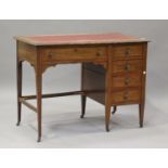 An Edwardian mahogany single pedestal desk, fitted with five drawers, height 75cm, width 99cm, depth