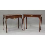 An Edwardian mahogany games table with inlaid top, on cabriole legs, height 71cm, width 75cm,