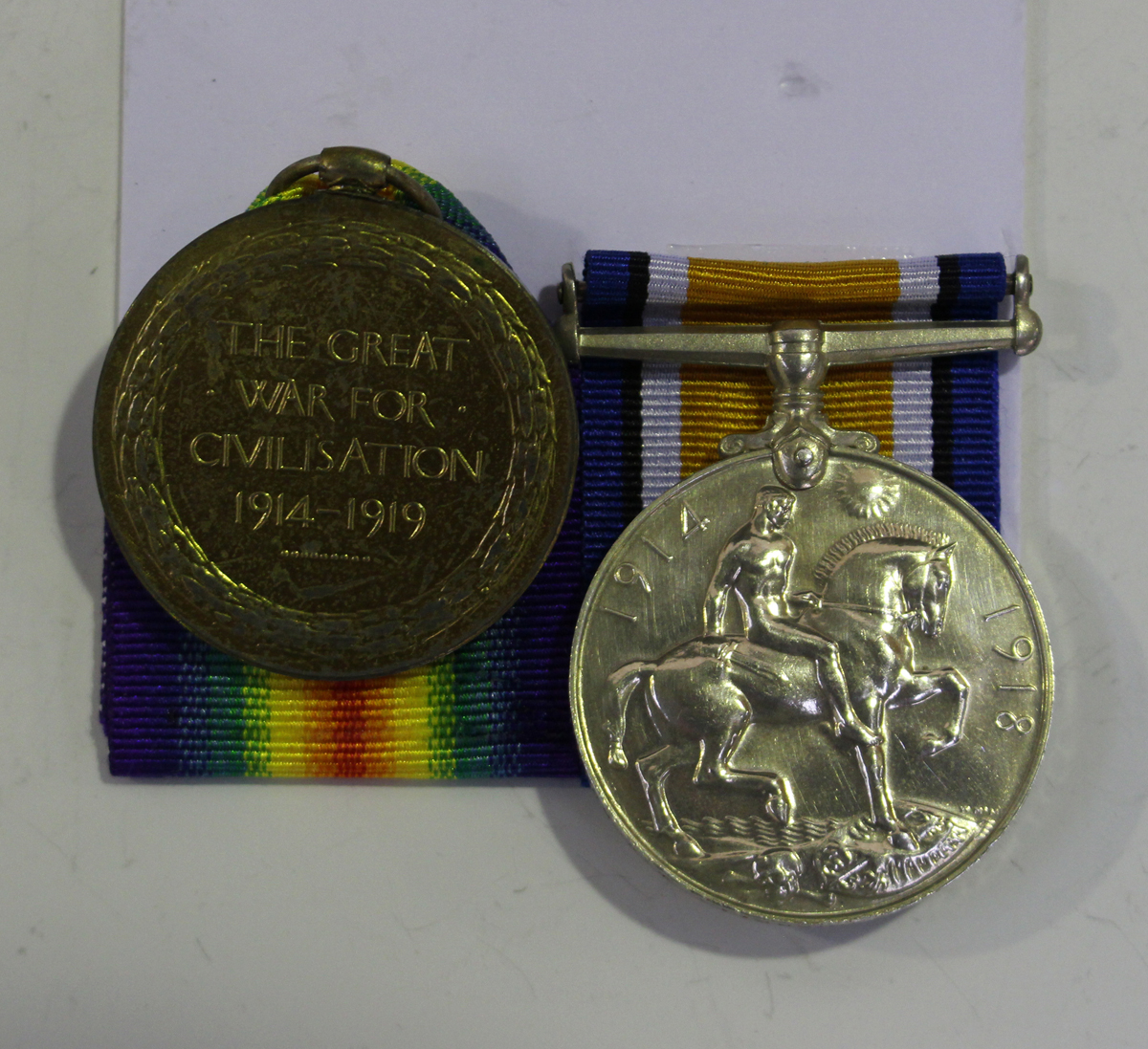 A 1914-18 British War Medal and a 1914-19 Victory Medal to '47232 Pte. G.E.Gumbrell. W.York.R.' - Image 2 of 4