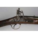 A 10-bore Brown Bess flintlock musket, barrel length, 98.5cm, the lockplate marked for East India