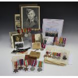 A group of four Second World War period medals, comprising 1939-45 Star, Africa Star, Defence