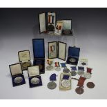 A collection of school attendance medals, including seven lead based alloy awarded by Hastings