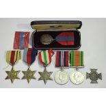 Five Second World War period medals, comprising 1939-45 Star, Africa Star, Italy Star, Defence Medal