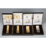 A group of thirteen Dunhill lighters of various designs, all boxed.Buyer’s Premium 29.4% (