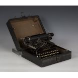 An early 20th century Corona typewriter, finished in black, bearing registration No. 320095,