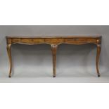 A pair of 20th century Continental fruitwood serpentine fronted side tables, on cabriole legs,