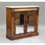 A Victorian rosewood and white marble-topped side cabinet, fitted with a pair of mirrored doors,