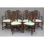 A set of six 20th century reproduction mahogany dining chairs with drop-in seats, comprising two