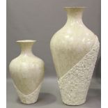 A large marble-effect composition vase, height 184cm, together with a smaller vase, height 121cm.