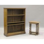 A late 20th century oak nest of three occasional tables, height 54cm, width 46cm, depth 30cm,