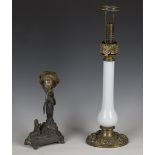 A 19th century pressed brass and opaline glass table lamp, height 50cm, together with a late 19th