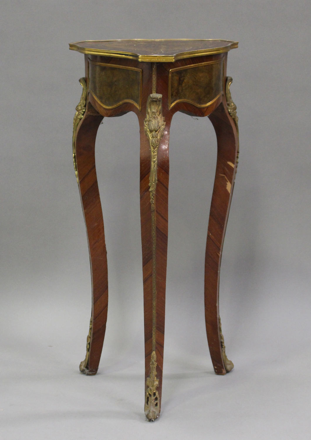 A 20th century Louis XVI style kingwood jardinière stand with gilt metal mounts, the floral
